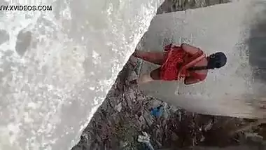 Sexy telugu aunty standing and peeing in open