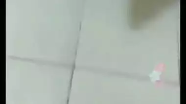 Naughty Indian girl sneaks in bathroom for sex video chat with XXX friend