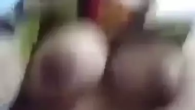 Desi fatty poses for the camera to reveal her big XXX boobs and slit