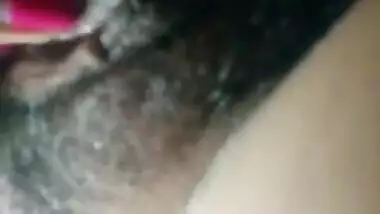 Cute girl showing her hairy pussy