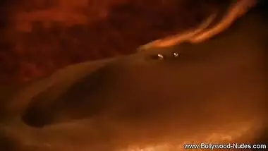 Oiled Up Indian Babe Takes A Bath And Plays