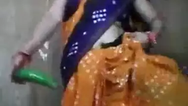 Smiling Indian bhabi tries out something new