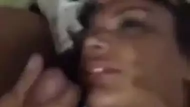 Sexy bitch eating cum from dick of her BF