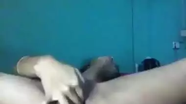Desi female lies on back and wildly masturbates her XXX cherry on camera