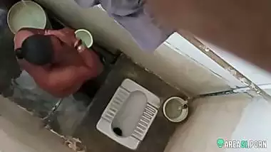 XXX clip of village aunty taking bath in outdoor taken on her son