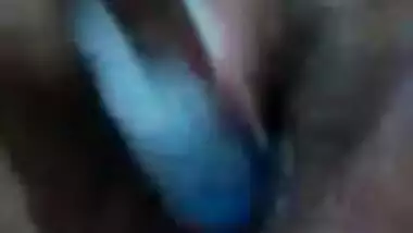 Indian wife chatting with husband friend