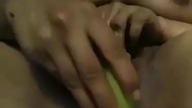 Dick-hungry Indian girl dildoing pussy with banana