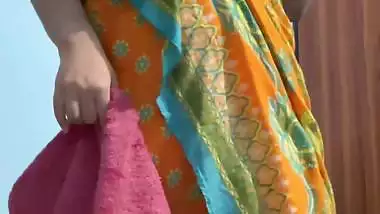Curvaceous Indian girl removing saree and nude show