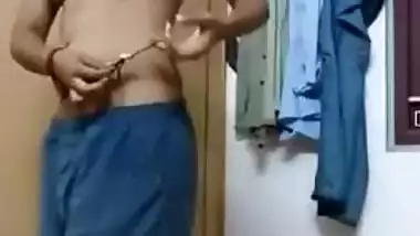 Indian MILF flashes her breasts on camera during changing in home porn
