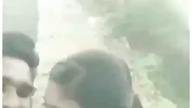Sweet Tamil girl giving blowjob outdoors