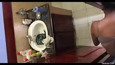 Desi babe nude captured in bathroom by