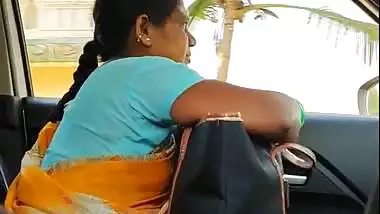 Man shows his dick to a milf in a moving van in Tamil porn