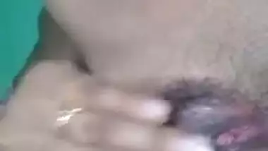 Desi bitch pulls pink dress up to XXX finger her wet hairy pussy
