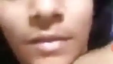 Indian XXX girl showing boobs and playing with nipples on video call